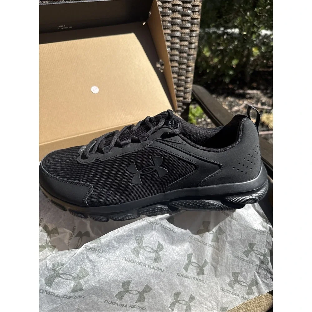 Size 15 - Under Armour Charged Assert 9 4E Wide Triple Black